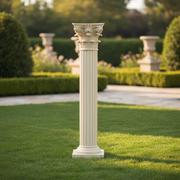Corinthian column with ornate acanthus leaf capital, fluted shaft, and classical base in old world European architectural style. Side Angle