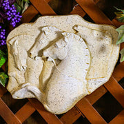 Relief sculpture featuring three horses in a classical, old world European style with ornate, Renaissance-inspired detailing. Other Angle