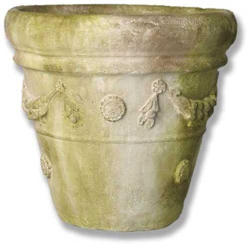 Ornate old world European planter with classical relief medallions and garland details in a weathered, antique style.