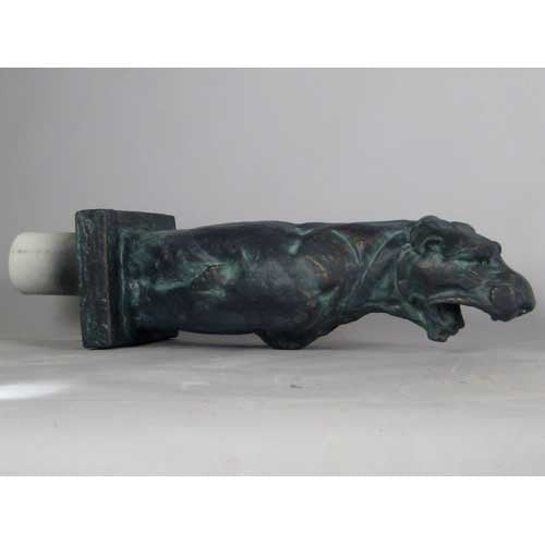 Gothic-style ornate gargoyle statue with open mouth, upright posture, and classical old world European detailing on a square base. Side Angle