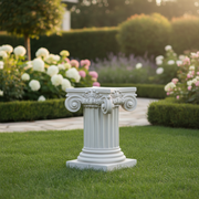 Corinthian column pedestal with ornate acanthus leaf detailing and classical fluted design in old world European style. Side Angle