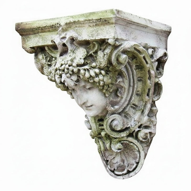 Ornate Baroque wall bracket with classical female face, intricate scrollwork, and grapevine detailing in old world European style.