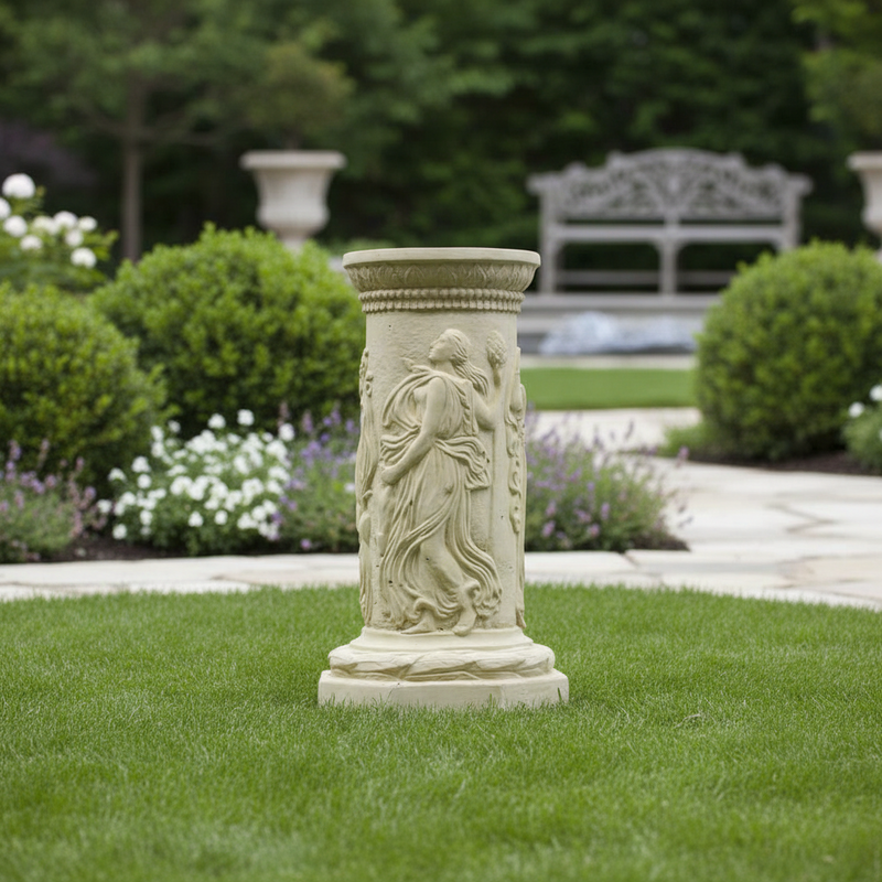 Classical Greek-style pedestal with ornate reliefs of draped figures and intricate decorative patterns in old world European design. Side Angle