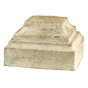Classical pedestal base with stepped, tiered design and weathered old world European architectural style.