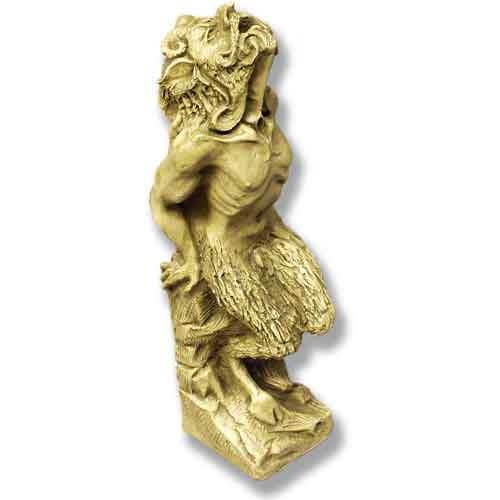 Grotesque gargoyle statue with exaggerated features and ornate medieval Gothic detailing in old world European style.