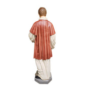 Saintly figure in classical Renaissance style robes, holding a palm frond and book, standing on an ornate pedestal. Different Angle