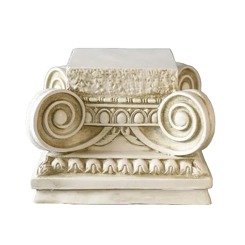 Classical Greek Ionic column capital with ornate volutes, egg-and-dart detailing, and sculpted acanthus leaf accents. Side View