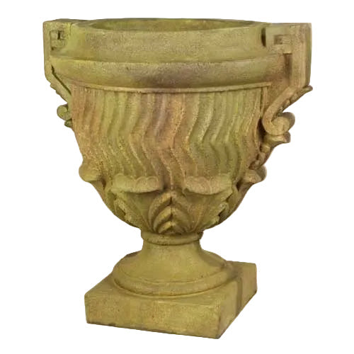 Ornate urn planter with classical old world European design, fluted body, scroll handles, and decorative leaf motifs on pedestal base.