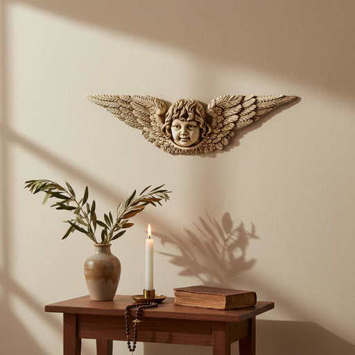Winged cherub face with ornate, detailed feathers in a classical Baroque style, evoking old world European architecture. Side Angle
