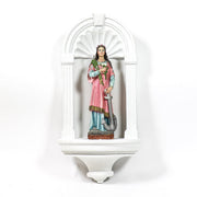 Saint statue in classical niche with ornate arch, old world European style, featuring Renaissance and Baroque detailing. Side View