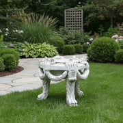 Ornate classical stool with carved Baroque details, draped garland motifs, and sculpted cabriole legs in old world European style. Side Angle