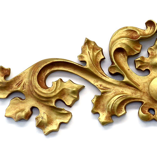 Ornate Baroque-style decorative applique with symmetrical scrollwork and classical old world European leaf motifs. Other Angle