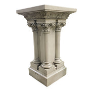 Classical pedestal with ornate Corinthian columns and intricate old world European detailing in a Renaissance architectural style. Different Angle
