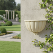 Ornate wall sconce with fluted bowl design, classical old world European style, featuring subtle Baroque-inspired detailing. Side Angle