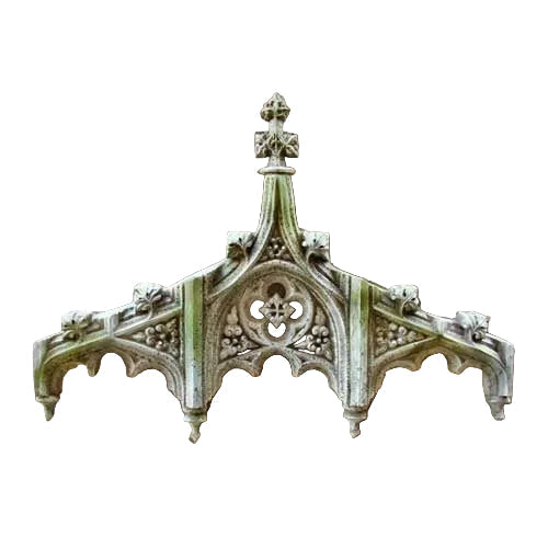 Gothic architectural pediment with ornate tracery, pointed arches, and intricate old world European detailing. Side View