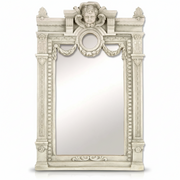 Ornate Baroque mirror with classical cherub crest, decorative swags, and intricate old world European architectural detailing. Side View