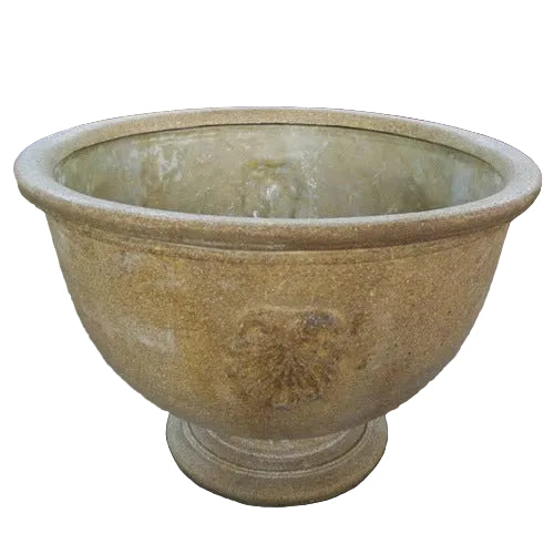 Ornate old world European planter bowl with classical pedestal base and subtle Baroque-style crest detailing on the side.