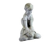 Boy crouching atop a turtle in an old world European style, featuring classical, ornate sculptural details and gentle expression.