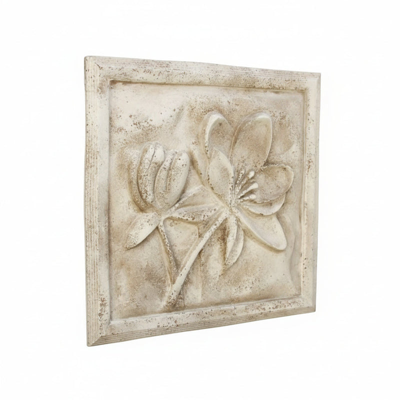 Floral relief wall plaque with ornate old world European style, featuring classical botanical motifs in a square frame. Side View
