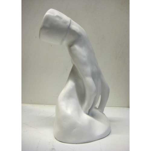 Classical Renaissance-style torso sculpture with detailed musculature and an unfinished, headless form on a smooth base. Side View