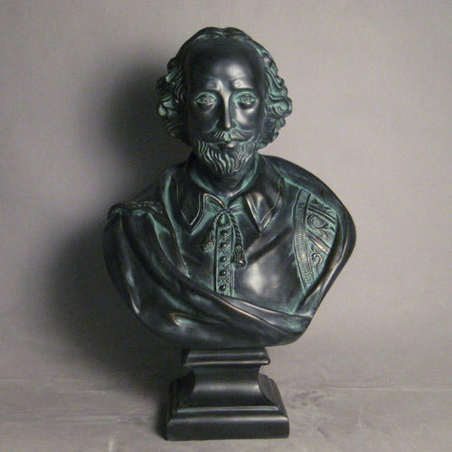 Bust of a bearded man in ornate Renaissance attire with classical detailing and old world European sculptural style. Side Angle