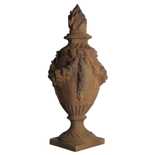 Ornate old world European urn with classical garland details, fluted pedestal base, and decorative finial in Baroque style.