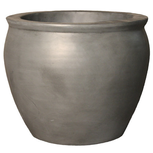 Rounded planter with smooth, minimalist design inspired by classical old world European style.