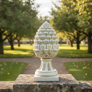 Ornate old world European finial with classical acanthus leaf details and a pinecone-inspired Baroque design on a square base Side Angle