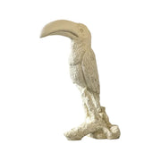 Toucan sculpture with ornate, old world European detailing and classical textured finish, perched on a stylized branch base. Side View