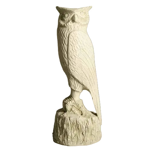 Owl statue with detailed feathers and classical old world European style, perched on a textured base with ornate carving.