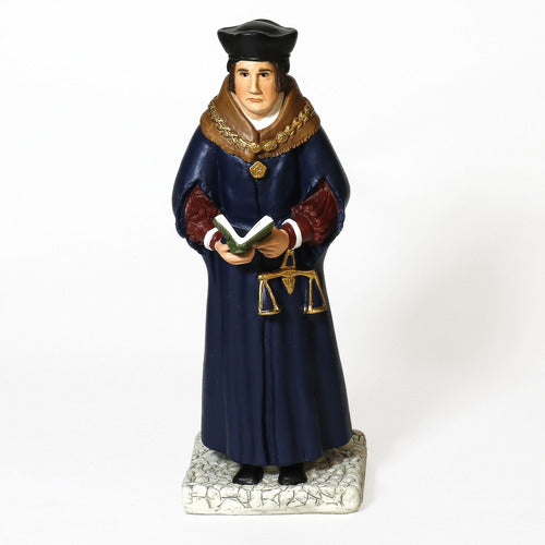 Renaissance-style figurine of a scholar in ornate robes holding a book and scales, featuring classical European details. Side View