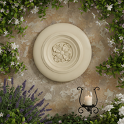 Ornate round ceiling medallion with classical old world European floral motif and raised Renaissance-style detailing. Side Angle