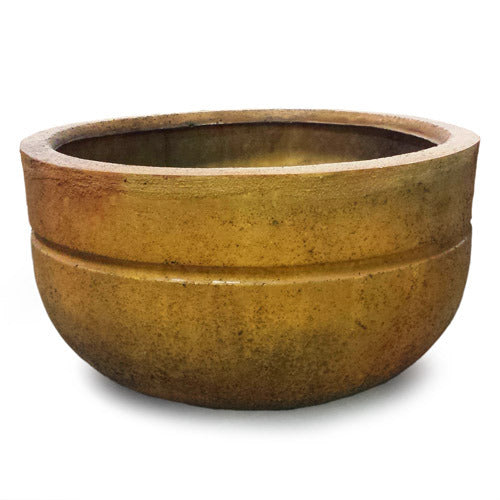 Round, wide-rimmed planter with a smooth, classical silhouette and subtle old world European detailing.