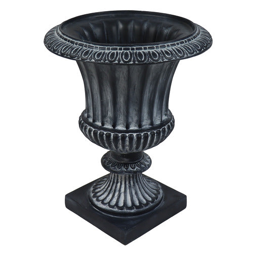 Ornate classical urn planter with fluted body, decorative rim, and pedestal base in old world European style. Side View