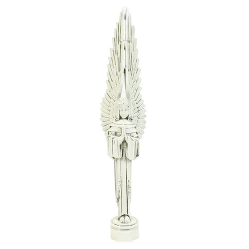 Winged angel statue with elongated, symmetrical wings and classical, old world European ornate detailing in a standing pose. Side View