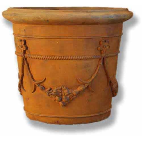 Ornate old world European planter with classical garland relief and Baroque-inspired decorative detailing around the rim and body.