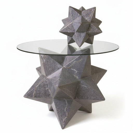 Star-shaped geometric table base with glass top, featuring ornate, old world European and classical design elements.