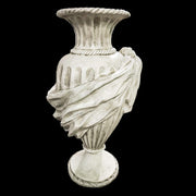 Ornate classical urn with fluted body, draped garland details, and rope-like rim, inspired by old world European design. Side Angle
