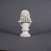 Classical Renaissance-style bust of a bearded man with detailed facial features and flowing hair on a pedestal base Side Angle