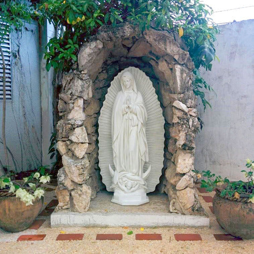 Virgin Mary statue in classical old world European style, ornate halo backdrop, hands in prayer, flowing robes, Renaissance influence Other Angle