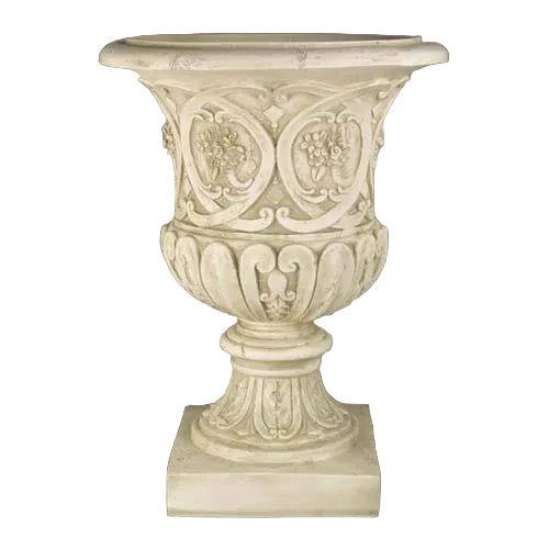 Ornate classical urn with intricate Baroque floral motifs and scrollwork, featuring an old world European pedestal base.