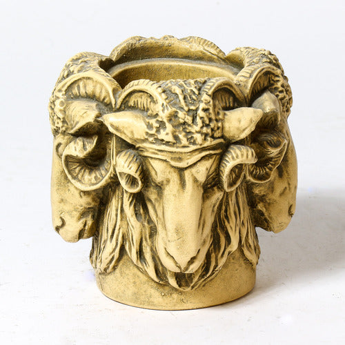 Ram head planter with ornate, old world European design, featuring classical sculpted details and Baroque-inspired decorative elements. Side Angle