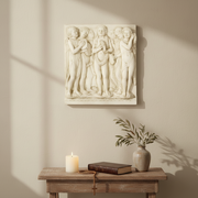 Bas-relief of seven children in classical Renaissance style, playing musical instruments with ornate, old world European detailing. Side Angle