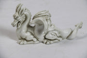 Baroque-style dragon figurine with ornate detailing, curled tail, outstretched wings, and classical old world European features. Side Angle