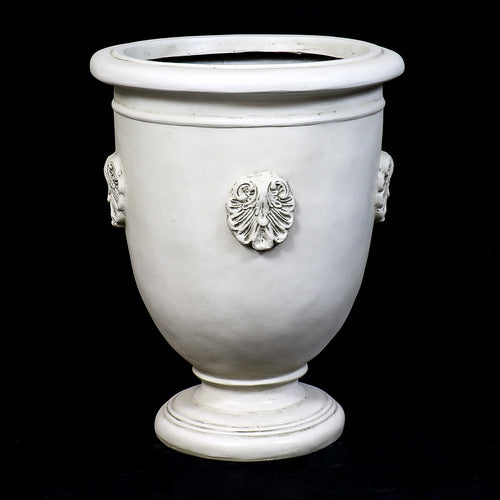Classical urn planter with ornate Baroque shell motifs and a pedestal base, featuring old world European design elements. Different Angle