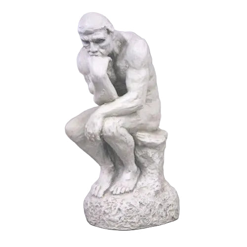 Classical sculpture of a seated man in a contemplative pose, inspired by Renaissance and old world European artistry.