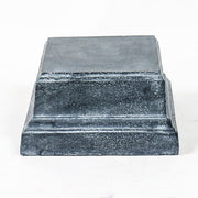 Square pedestal base with stepped classical design, featuring ornate old world European detailing and subtle weathered texture. Side View
