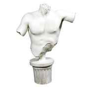Classical Greek male torso sculpture with missing head and arms, displayed on an ornate fluted pedestal in old world European style. Side View