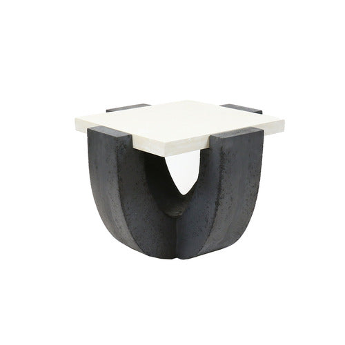 Square side table with a classical, sculptural base and a minimalist top, featuring bold, architectural old world European design elements.