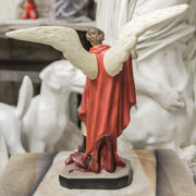 Archangel with flowing cape and ornate armor in classical style, standing over a dragon, holding a spear in dramatic pose. Other Angle